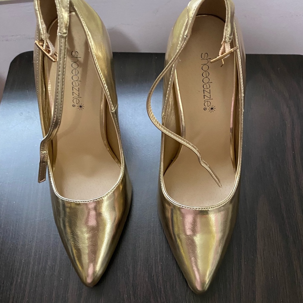 Gold high heels